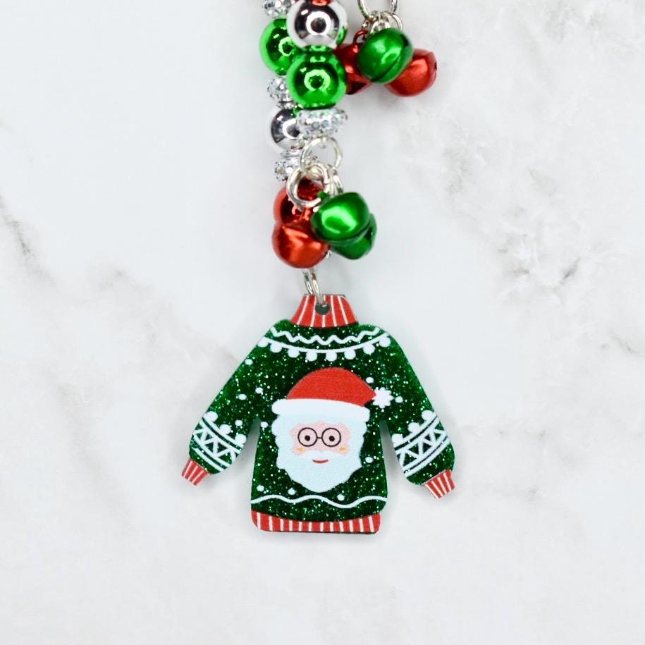 Keychain with Santa Claus ugly sweater in a green sweater design on a white background