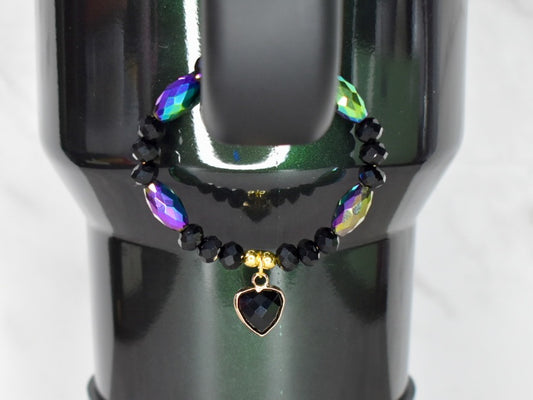 Black and iridescent beads handle bracelet with gold accented heart charm