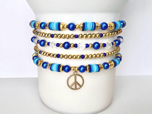 Blue gold and crystal beads with heishi beads in blues with peace charm in stack for tumbler Stanley or wrist