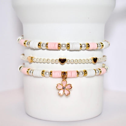 pink pearl heart gold beads with cherry blossom charm