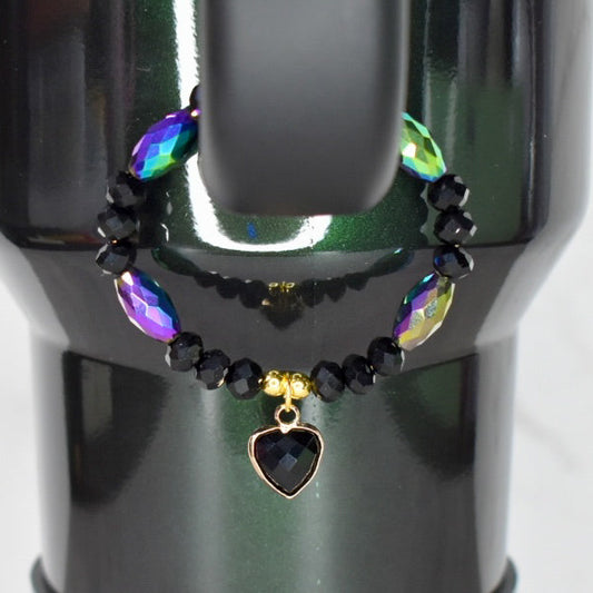 Black and iridescent beads handle bracelet with gold accented heart charm