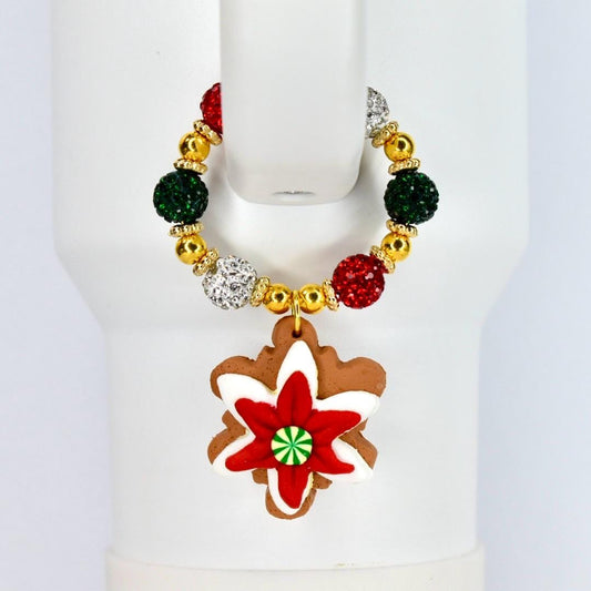 Colorful gingerbread themed beaded necklace with a decorative pendant on a mannequin.