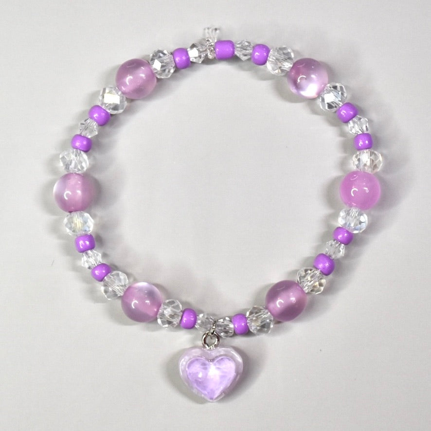 Lavender beaded necklace for Labubu doll with lavender and sparkles beads and a lavender heart charm.