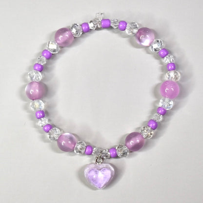 Lavender beaded necklace for Labubu doll with lavender and sparkles beads and a lavender heart charm.