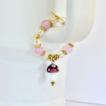 Pink beaded mushroom charm handle bracelet