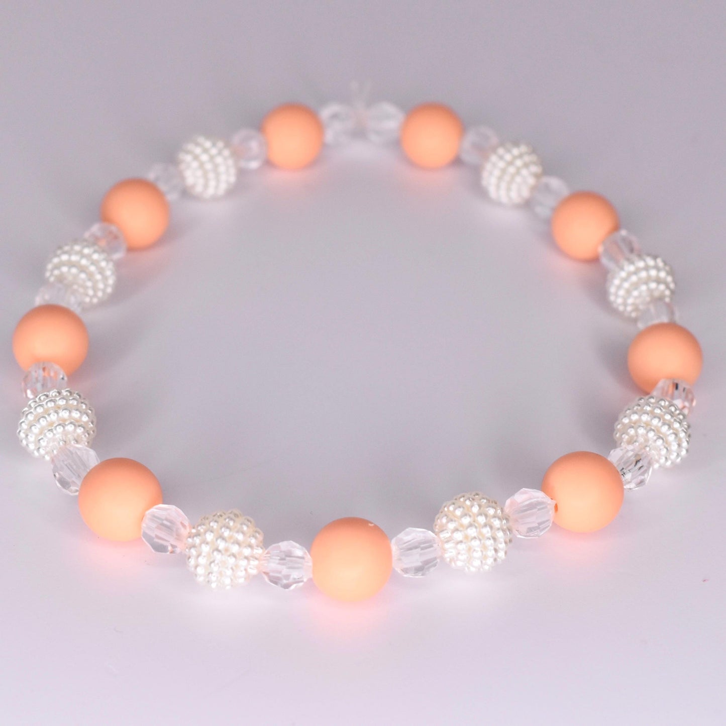 Peaches and Cream Bracelets: Orange & Ivory Accessory