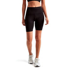Calathea Collective black high-waisted bike shorts with pockets and signature logo detail on back waistband.
