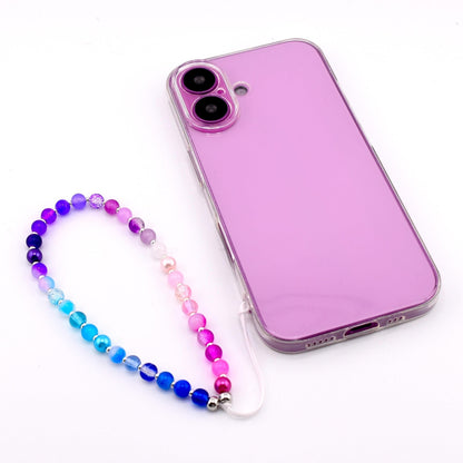 Calathea Collective handmade beaded phone charm wrist strap with gradient of pink, purple, and blue beads and pearl accents.