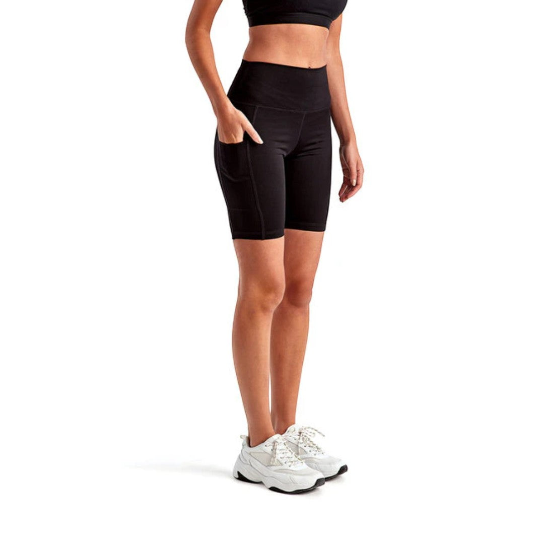 Calathea Collective black high-waisted bike shorts with side pockets and signature logo detail on back waistband.