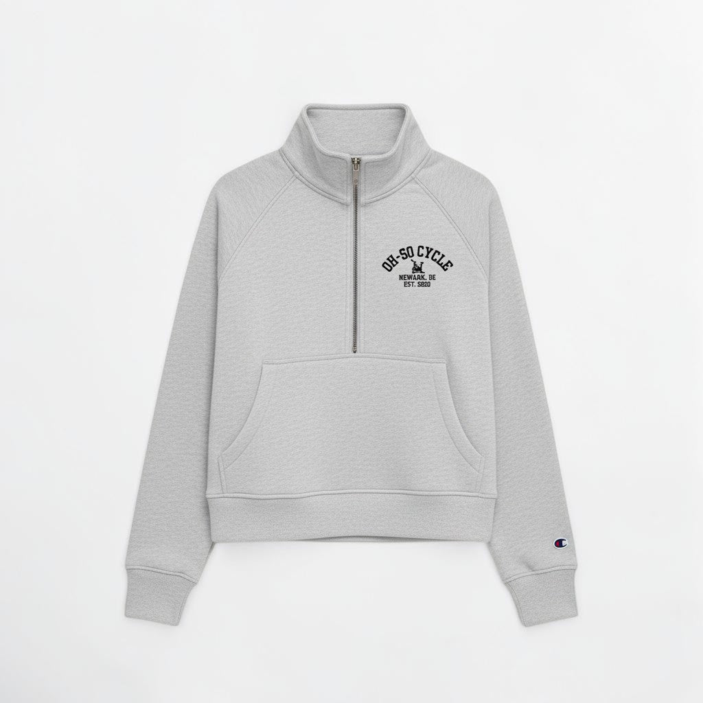 Calathea Collective gray cropped oversized quarter zip sweatshirt with a front pouch pocket and embroidered logo.