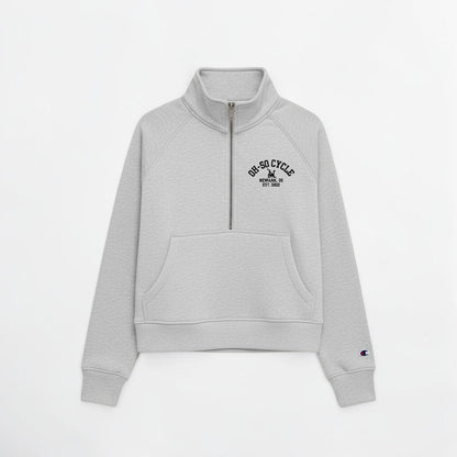 Calathea Collective gray cropped oversized quarter zip sweatshirt with a front pouch pocket and embroidered logo.