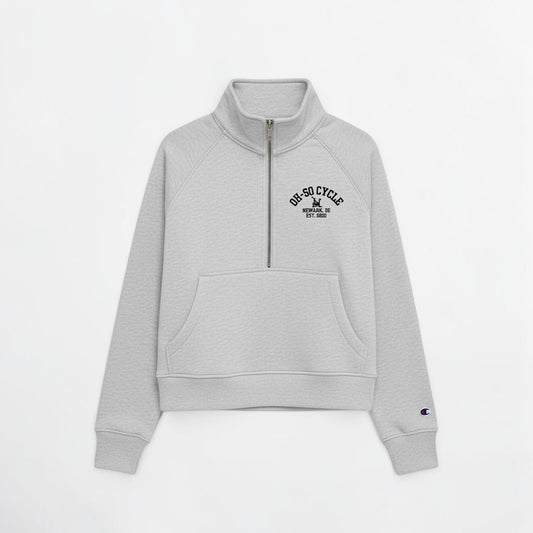 Calathea Collective gray cropped oversized quarter zip sweatshirt with a front pouch pocket and embroidered logo.