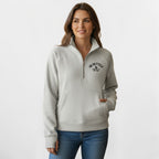 Calathea Collective light grey cropped oversized quarter zip sweatshirt with thumbholes and a front pouch pocket. Features black text graphic on chest.