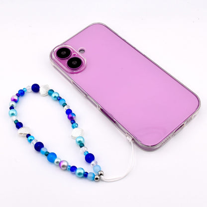 Calathea Collective ocean blue seashell phone charm wrist strap with pearl and glass beads. Features silver-tone seashell accents.
