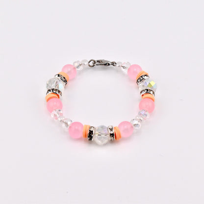 Calathea Collective pink mesa sunset beaded tumbler handle bracelet with peach, blush pink, and clear crystal beads and rhinestone accents.
