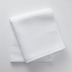Calathea Collective white terry cloth sweat towel with Oh So Cycle logo, perfect for indoor cycling classes.