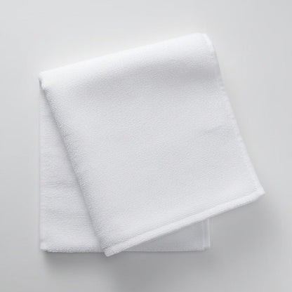 Calathea Collective white terry cloth sweat towel with Oh So Cycle logo, perfect for indoor cycling classes.
