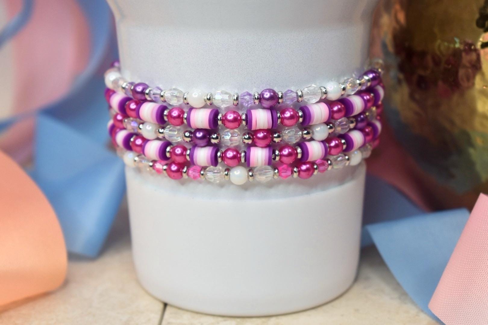Pink and purple beaded bracelets for tumblers and Stanley cups