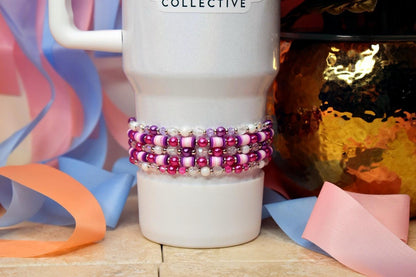 Stanley with a pink purple and crystal beaded set