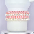 A white Stanley tumbler wrapped with a classic and elegant bracelet stack made of alternating rows of glossy pink and white pearl beads. The bracelets are styled as Stanley cup accessories with a soft and feminine touch.