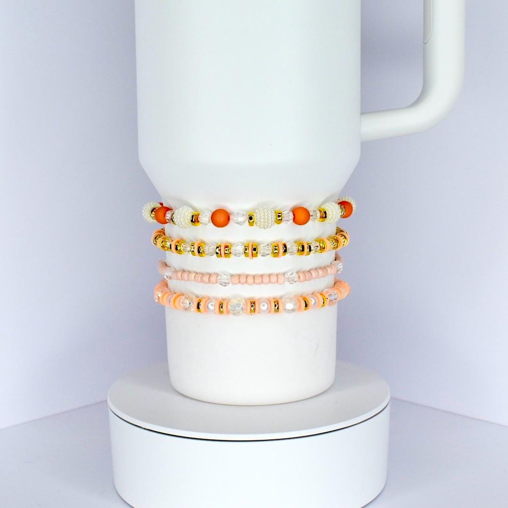 Orange and Gold Bracelet Stack with Pearl and Clear Bead Accents
