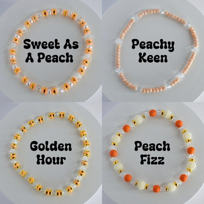 Orange and Gold Bracelet Stack with Pearl and Clear Bead Accents