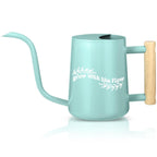 Turquoise watering can with wooden handle and white Grow with the Flow text surrounded by leaf graphics perfect calming gift for plant lovers and self-care moments