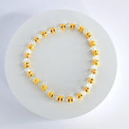 Orange and Gold Bracelet Stack with Pearl and Clear Bead Accents