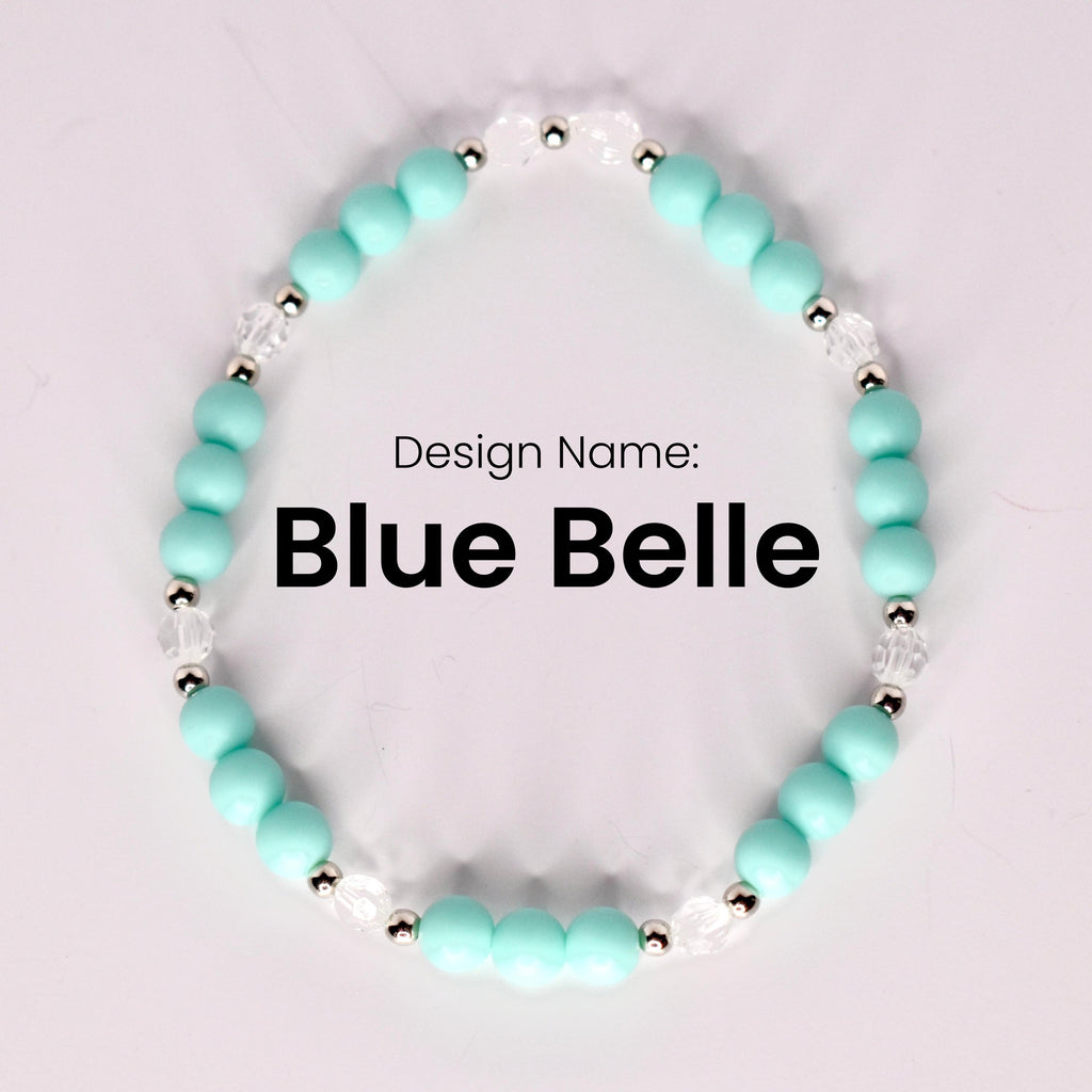 A single bracelet named "Blue Belle" displayed in a circular shape on a light background, made of matte turquoise beads, small silver spacer beads, and clear faceted beads. The design name is centered in bold black text.