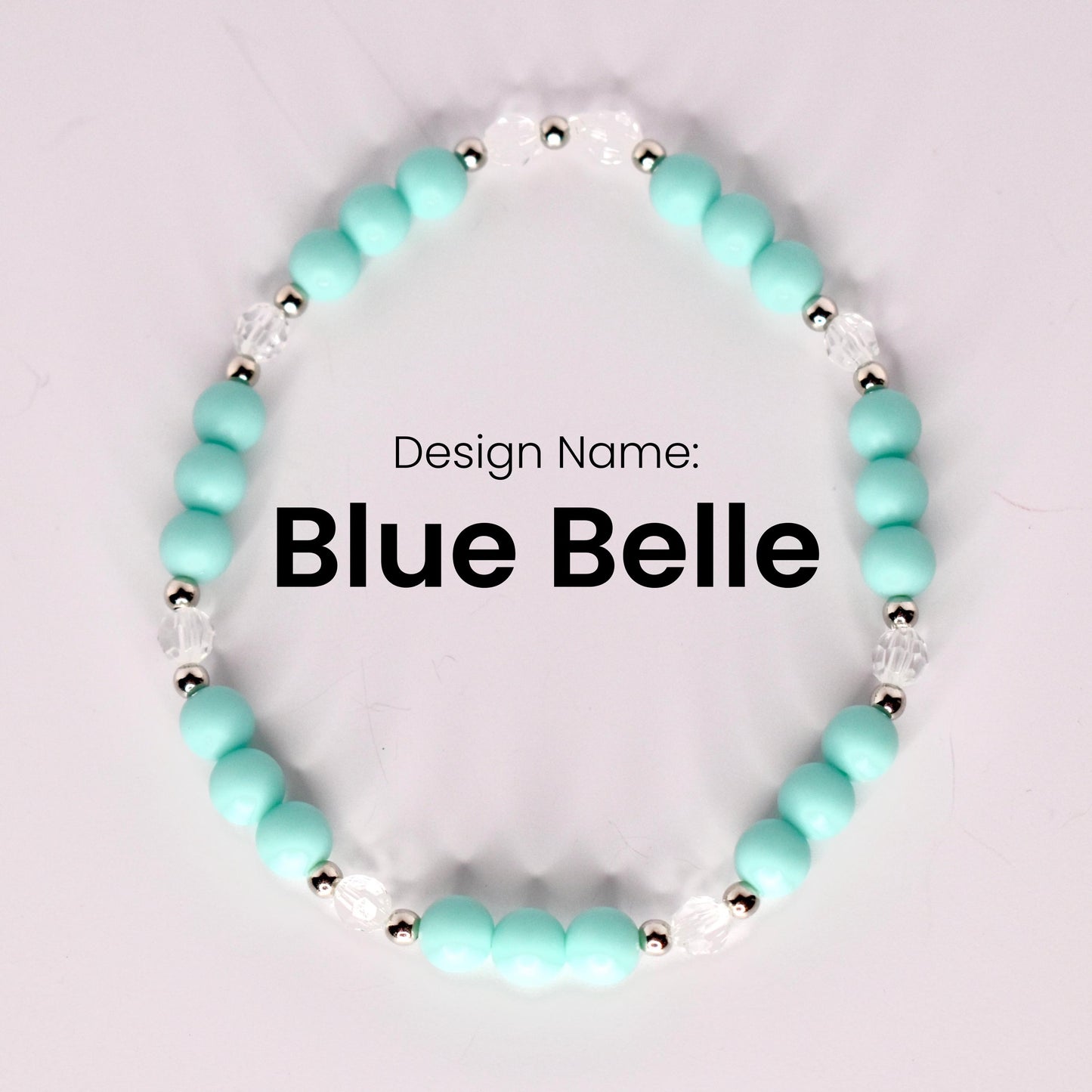 A single bracelet named "Blue Belle" displayed in a circular shape on a light background, made of matte turquoise beads, small silver spacer beads, and clear faceted beads. The design name is centered in bold black text.