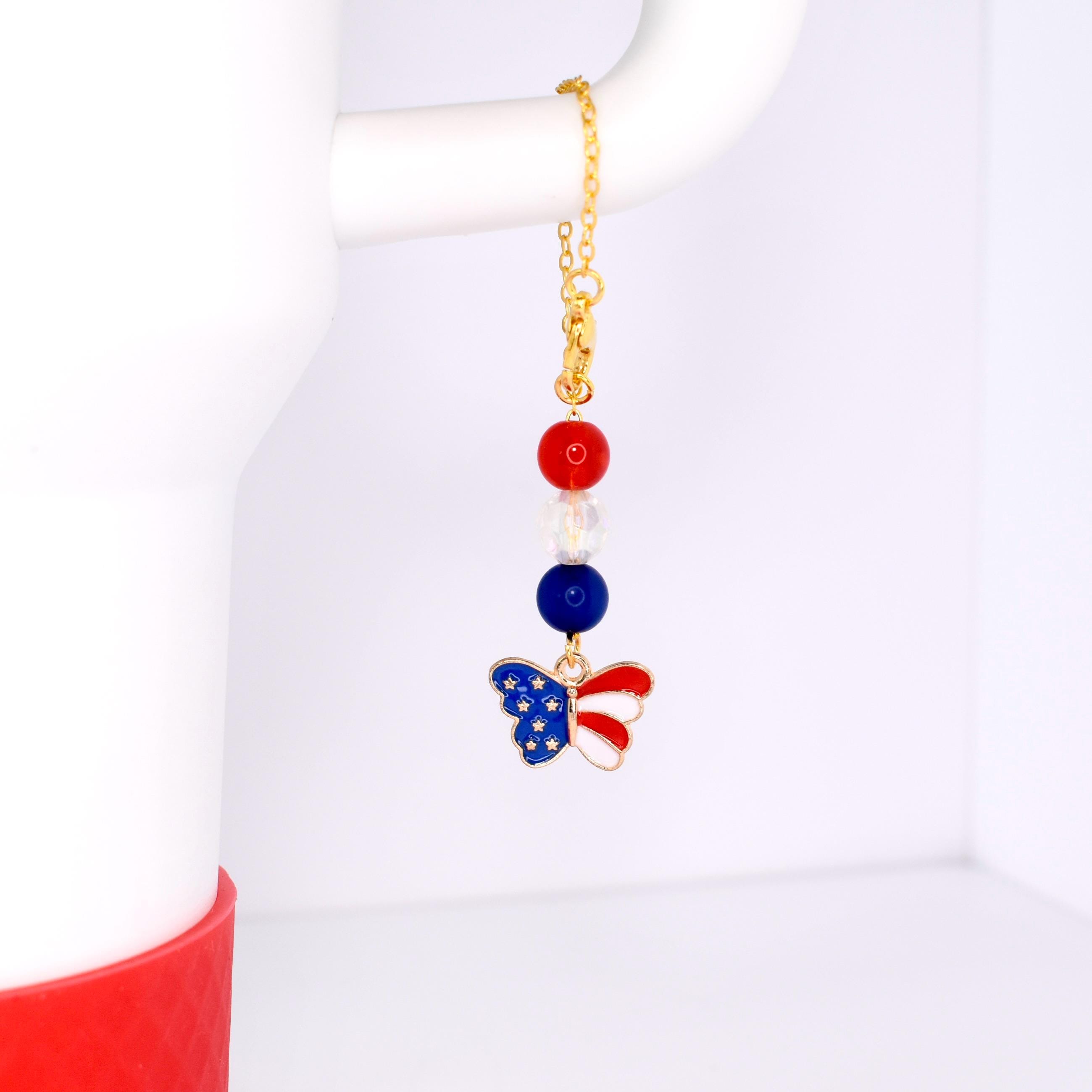 red white blue flag design butterfly charm bracelet on white Stanley handle charm cup patriotic for Independence Day gift for bbq drinkware 4th of July host gift gold chain cup bracelet Stanley decor yeti charm bracelet