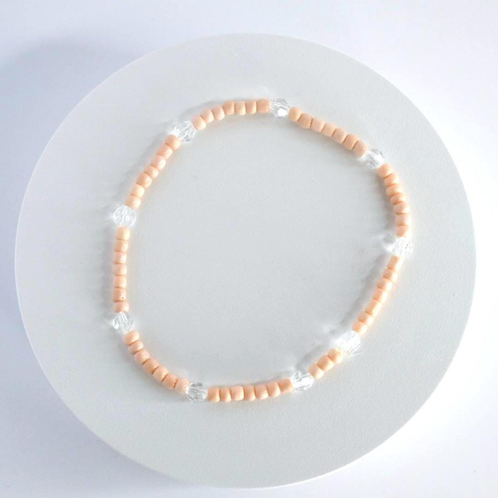 Orange and Gold Bracelet Stack with Pearl and Clear Bead Accents