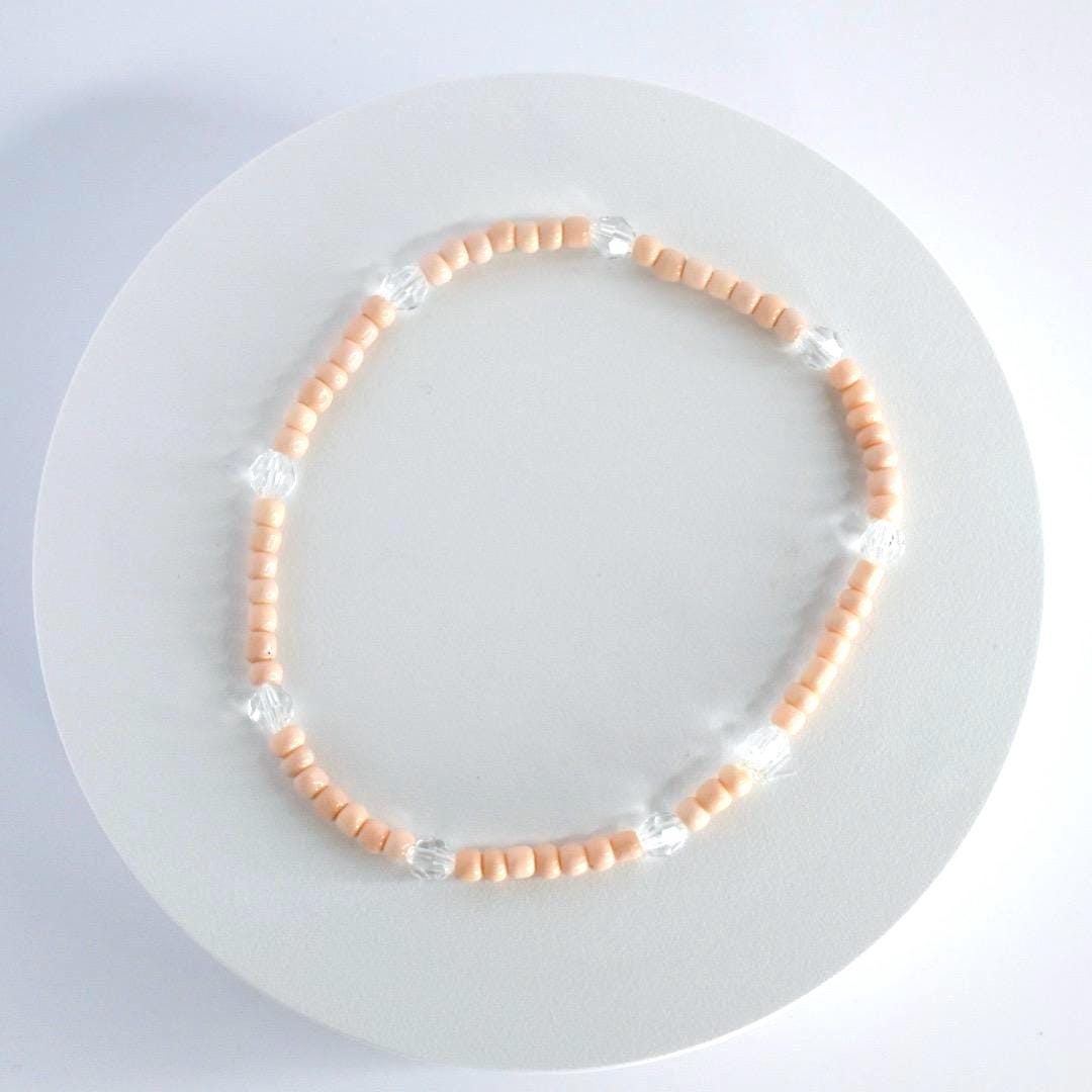 Orange and Gold Bracelet Stack with Pearl and Clear Bead Accents