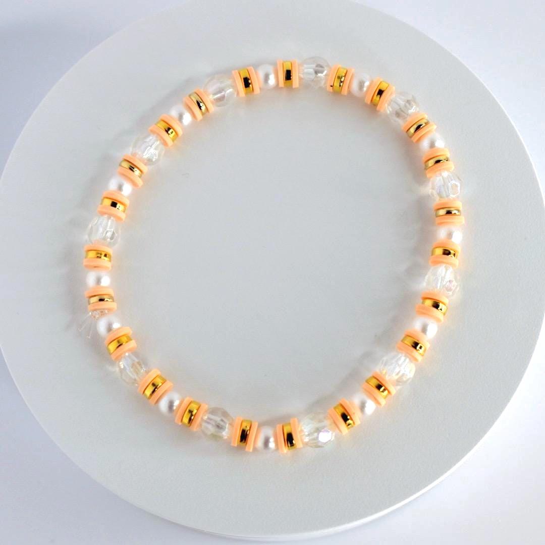 Orange and Gold Bracelet Stack with Pearl and Clear Bead Accents