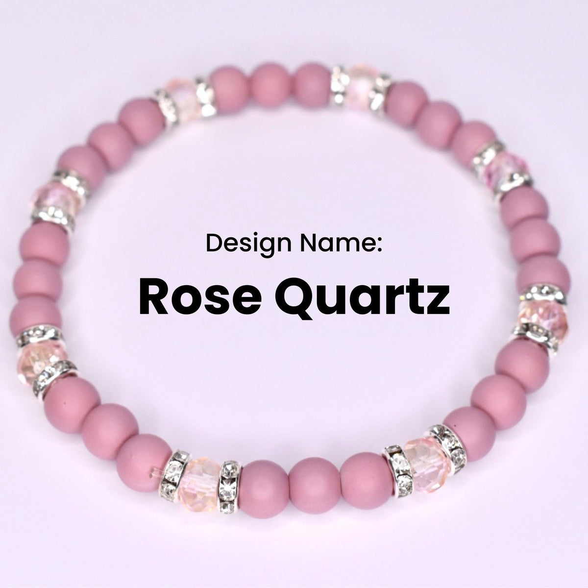 A pink Rose Quartz bracelet with alternating round beads and crystal-studded silver accents. The design name 'Rose Quartz' is displayed in bold black text against a white background. The bracelet is a stretch style.