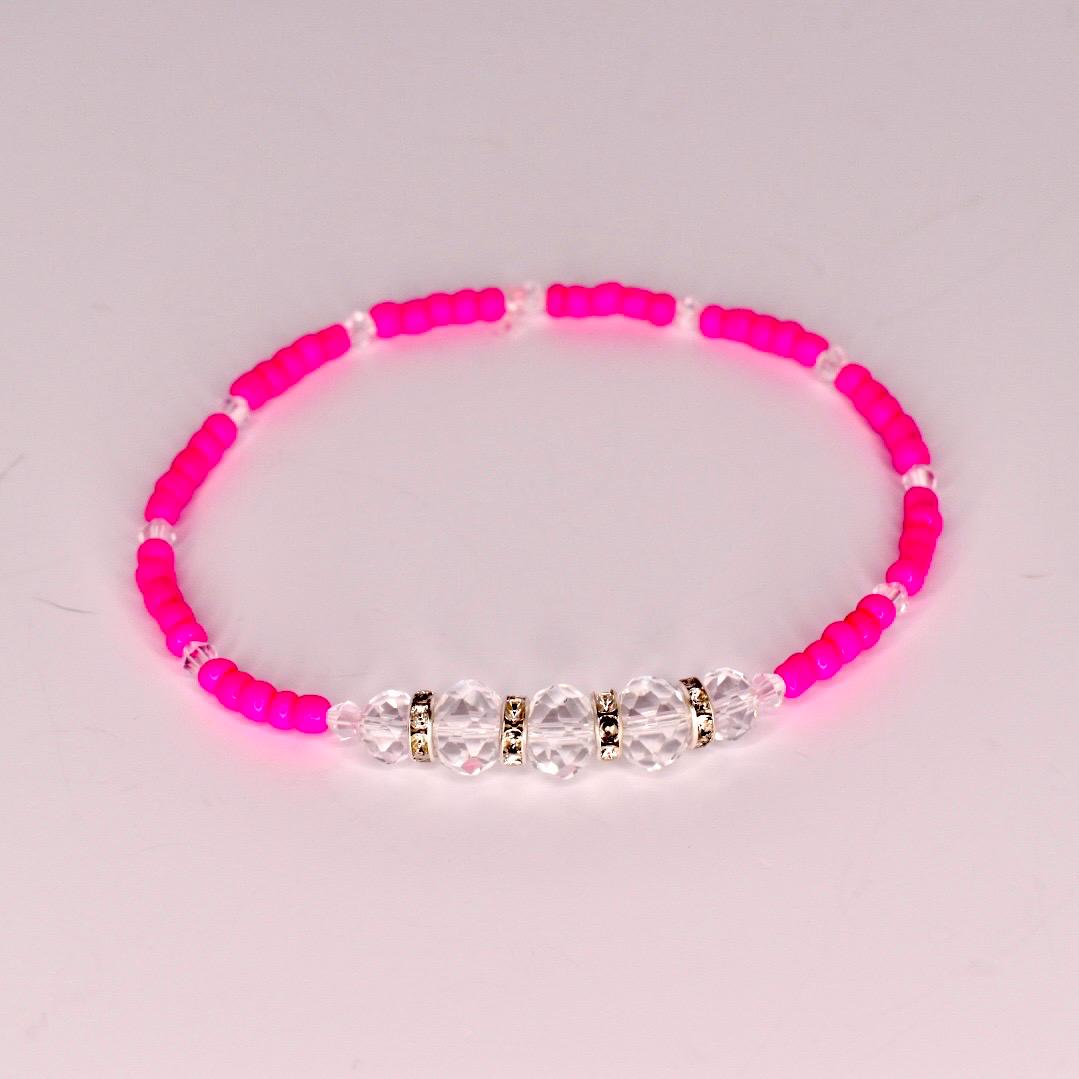 Tropical tumbler bracelet set of 5 with monstera leaves, sparkly green beads, and pink hibiscus flowers—perfect for beach vacations and poolside flair.