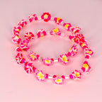 Vibrant tumbler bracelet stack featuring palm leaf charms and floral accents—bring the island vibe to your vacation tumbler decor with this fun, handmade set.