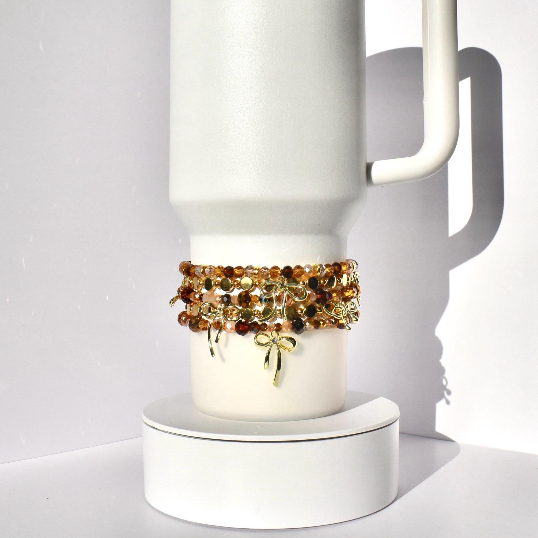 Tumbler Bracelet Collection Cup Holder Jewelry Glass Bead Set Amber Brown Gold Color Combination Decorative Bow Charm Accent Elastic Band Design Tumbler Accessories Perfect Gift Idea Stretchy Jewelry Collection Custom Drink Holder Style