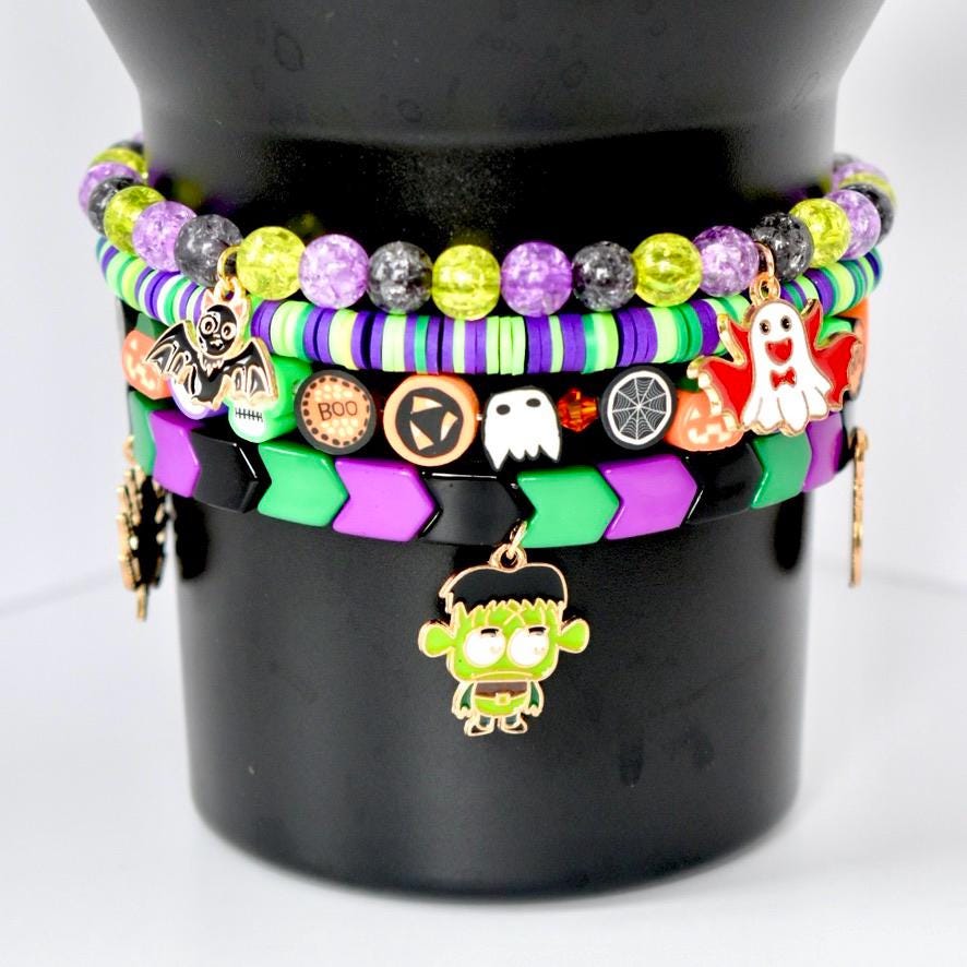 Halloween Tumbler Bracelet Stack Stretch Band Collection Metal Charm Set Orange Black Tumbler Accessory Holiday Drink Cup Design Spooky Style Accent Perfect Party Essential Beautiful Display Collection Seasonal Gift Idea Festive Home