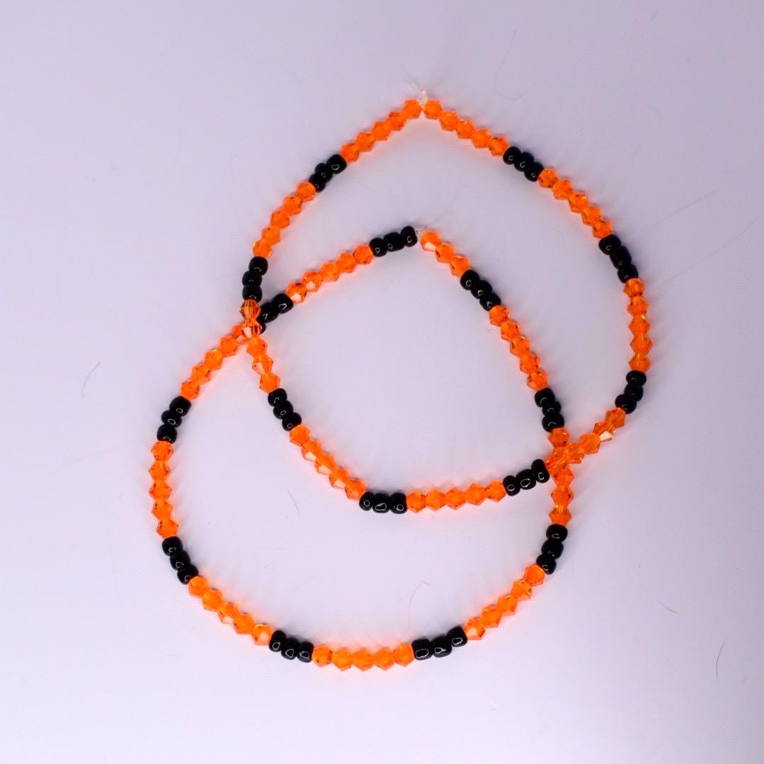 Halloween Tumbler Bracelet Stack Stretch Band Collection Orange Black Metal Charm Design Holiday Drink Cup Perfect Party Essential Spooky Style Accent Beautiful Display Collection Seasonal Gift Idea Festive Addition