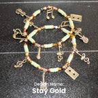 Camouflage Bracelet Stack with Music Charms: Gold, Brown, and Orange Charm Bracelets