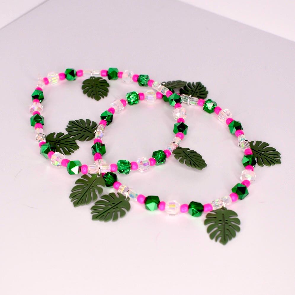 Tumbler charm bracelet set featuring pink blooms and green leaves—thoughtful handmade gift idea for bridesmaids, besties, or tropical-themed celebrations.