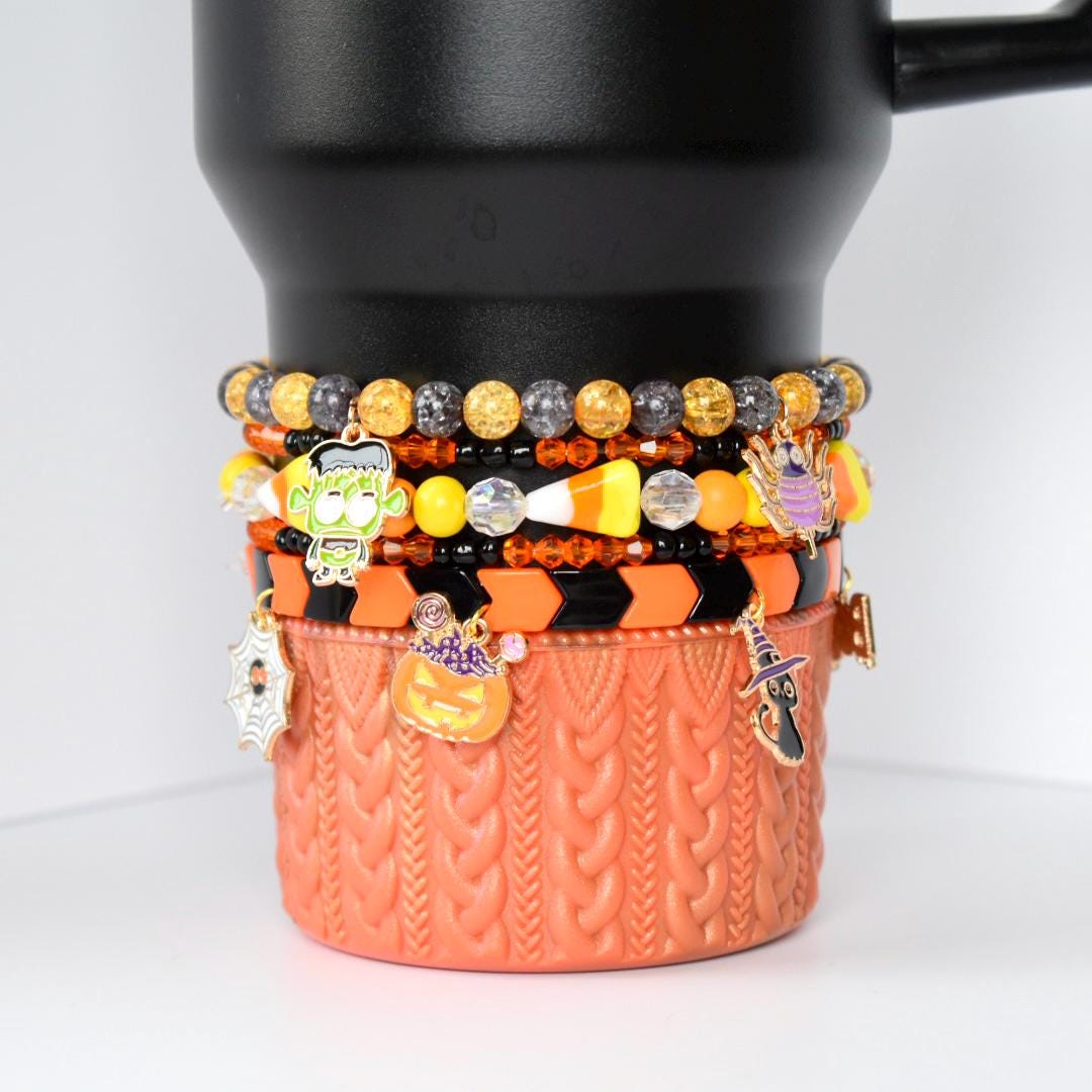 Halloween Tumbler Bracelet Stack Stretch Band Collection Metal Charm Set Orange Black Tumbler Accessory Holiday Drink Cup Design Spooky Style Accent Perfect Party Essential Beautiful Display Collection Seasonal Gift Idea Festive Home