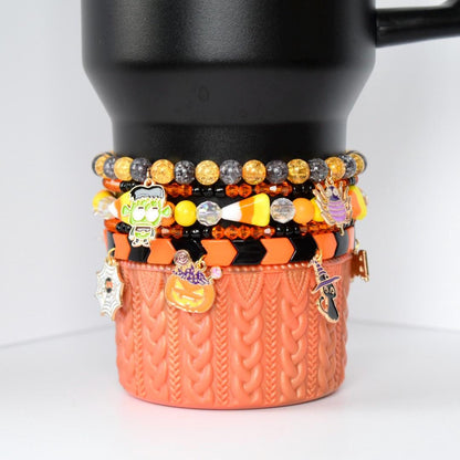 Halloween Tumbler Bracelet Stack Stretch Band Collection Metal Charm Set Orange Black Tumbler Accessory Holiday Drink Cup Design Spooky Style Accent Perfect Party Essential Beautiful Display Collection Seasonal Gift Idea Festive Home