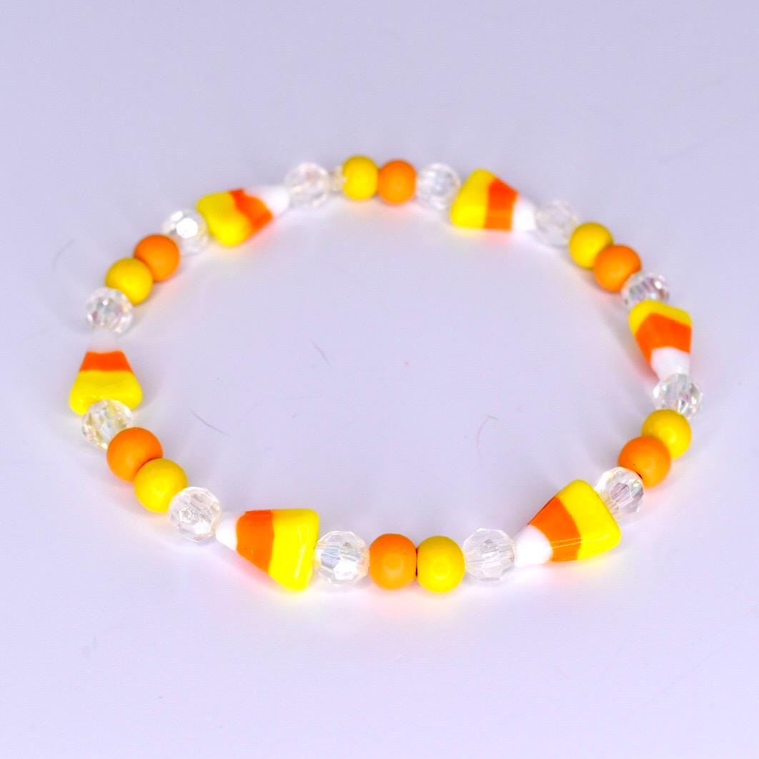 Halloween Tumbler Bracelet Stack Metal Charm Collection Stretch Band Set Orange Black Tumbler Accessory Holiday Drink Cup Design Perfect Party Essential Spooky Style Accent Beautiful Display Collection Seasonal Gift Idea Festive Addition