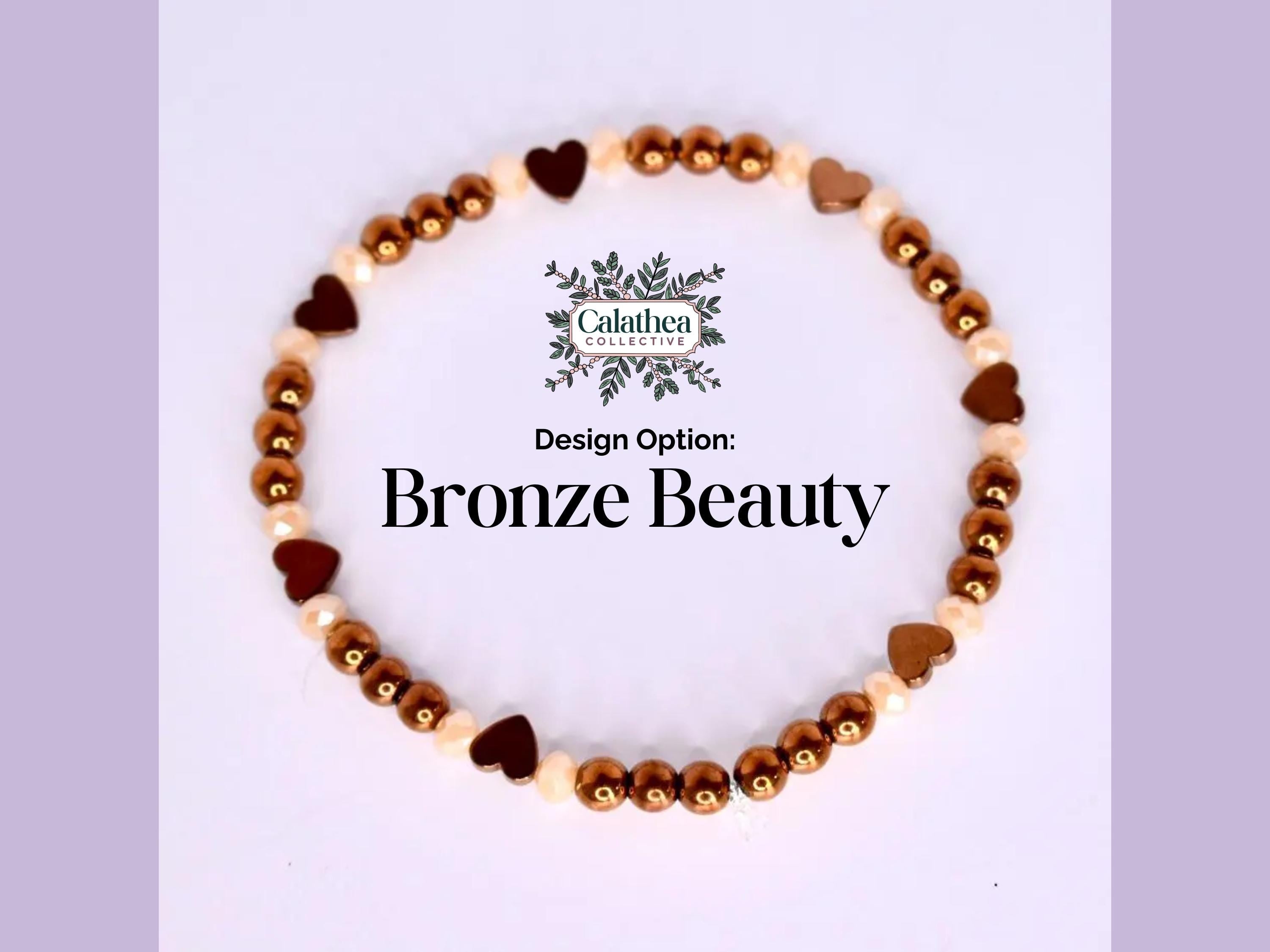 Bronze Beauty bracelet. The bracelet features a circular design with alternating bronze-colored beads and heart-shaped charms. The beads are a mix of bronze and cream colors. The bracelet is displayed on a white surface, with the words 'Design Option: Bronze Beauty' in black text.