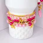 Ibiza Sunset Bracelet Collection: Pink and Gold Beaded Bracelets with Bow Charm