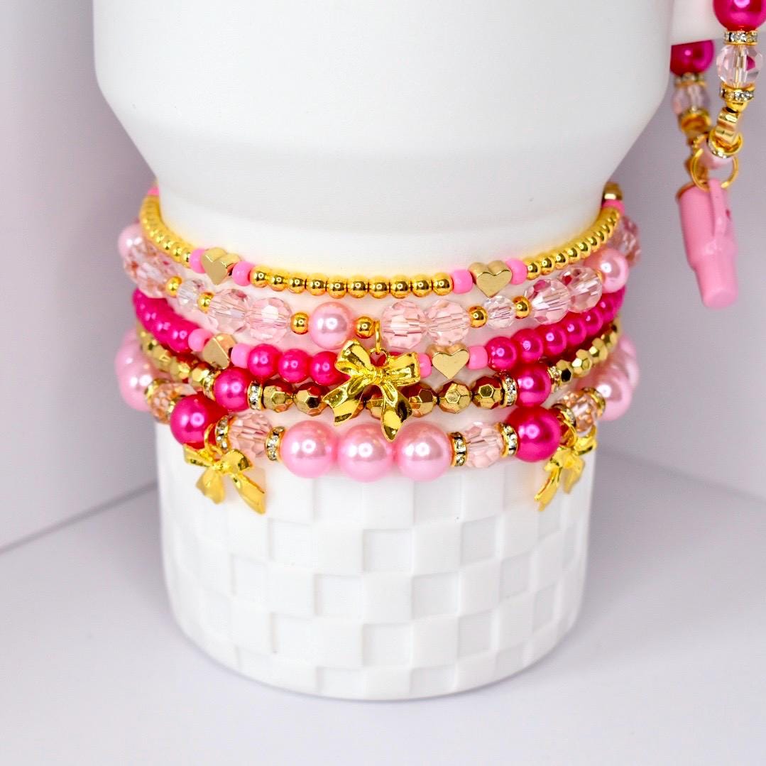 Ibiza Sunset Bracelet Collection: Pink and Gold Beaded Bracelets with Bow Charm