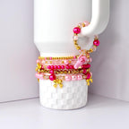 Ibiza Sunset Bracelet Collection: Pink and Gold Beaded Bracelets with Bow Charm