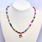 Personalized Festival Jewelry Rainbow Seed Bead Necklace Gold Filled Bubble Letter Charm Adjustable 16-20" Chain Length Summer Fashion Essential Handmade Jewelry Piece Custom Initial Option Beautiful Statement Piece Perfect Gift Choice